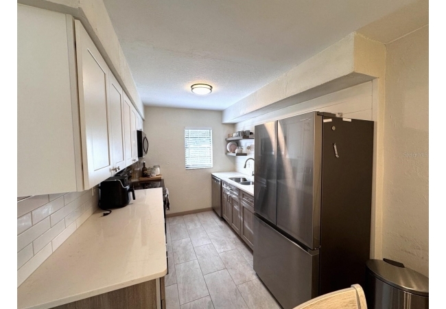 3414 NW 21ST DR #E4 Condo photo 5