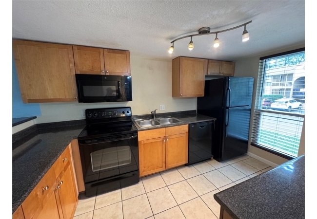 1810 NW 23RD BLVD #141 Condo photo 2