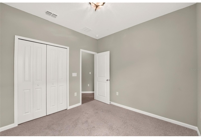 13559 NW CONVERGENCE BLVD House photo 36