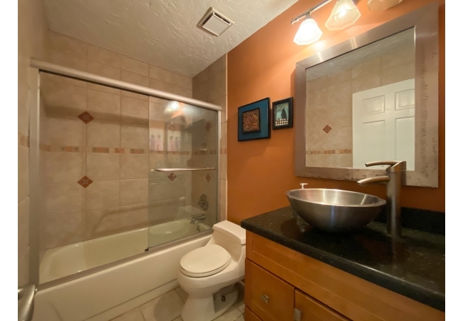 Each unit has 2 full bathrooms in the main home with a full bathroom in the above garage studio.